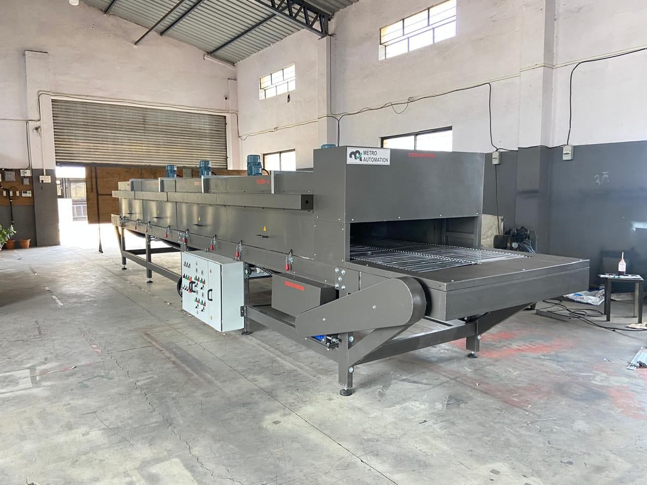 Conveyorised oven on the shop floor
