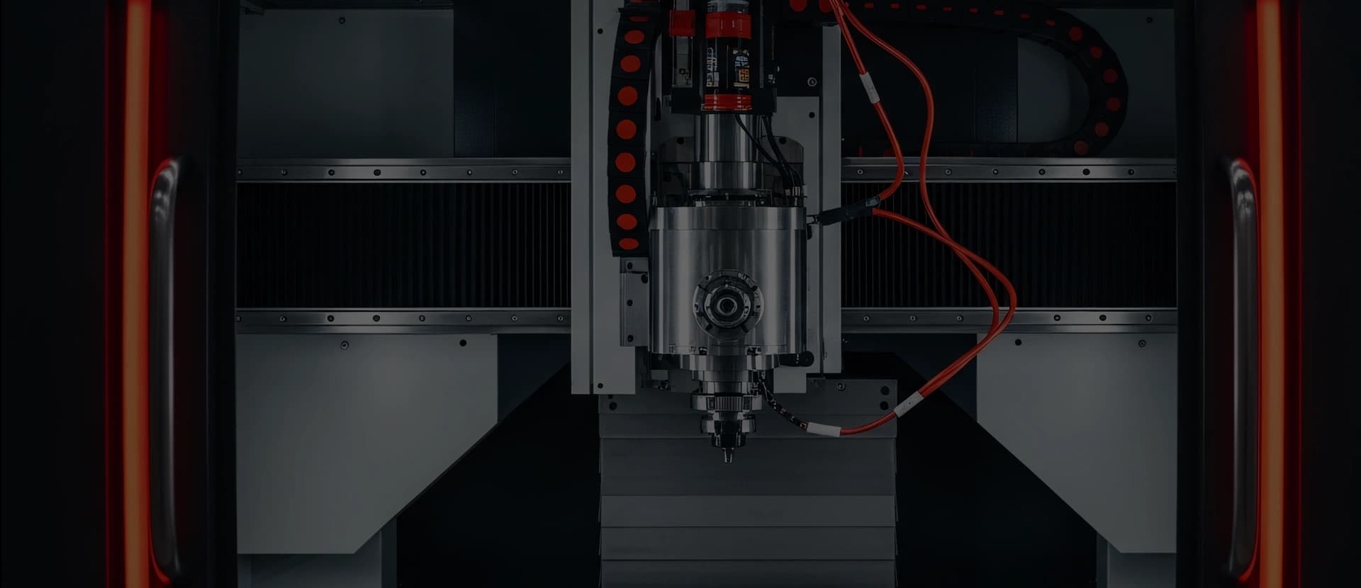 CNC machining centre cutting a steel part